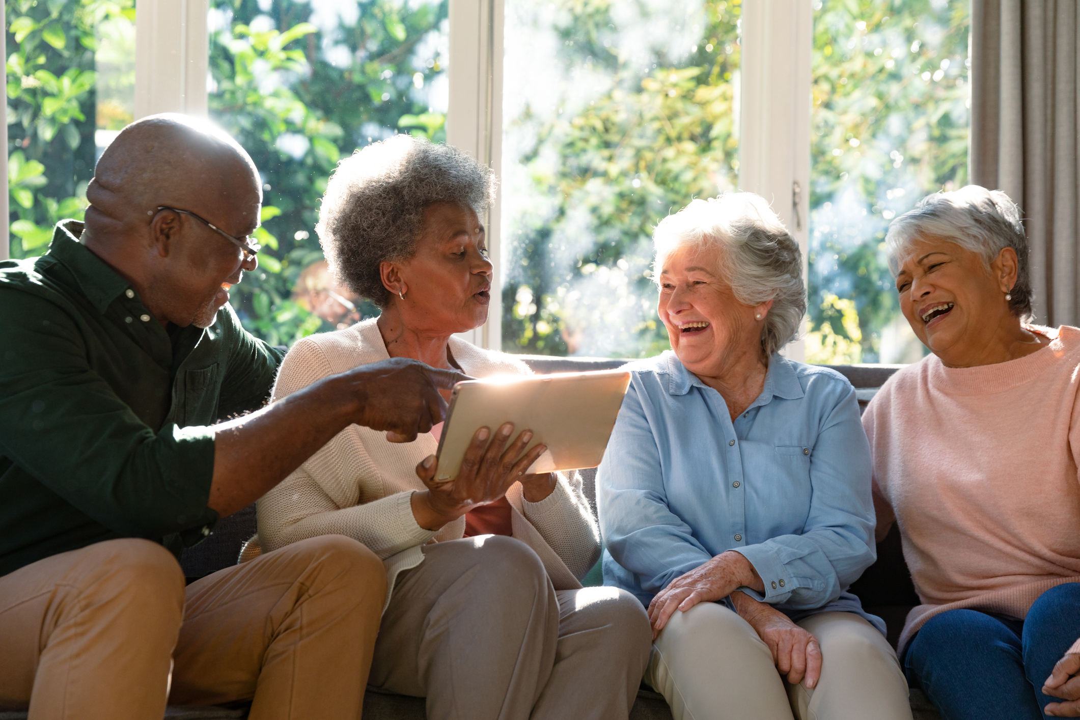 A group of happy seniors living together in a community.